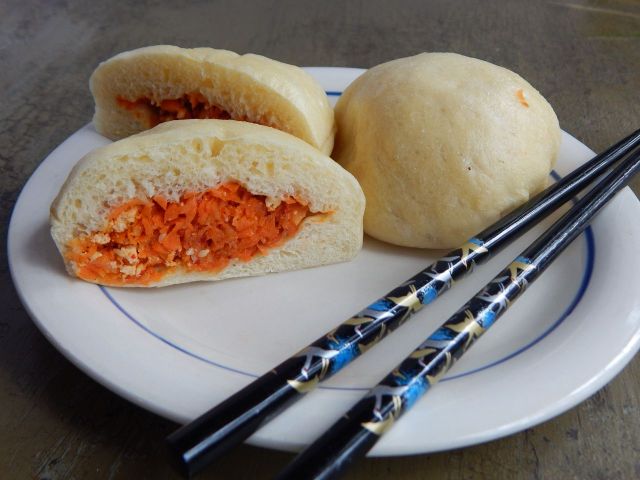 Homemade steamed buns make you wait, but your first bite is worth it. Get dumpling recipes at TwiceasTasty.com.