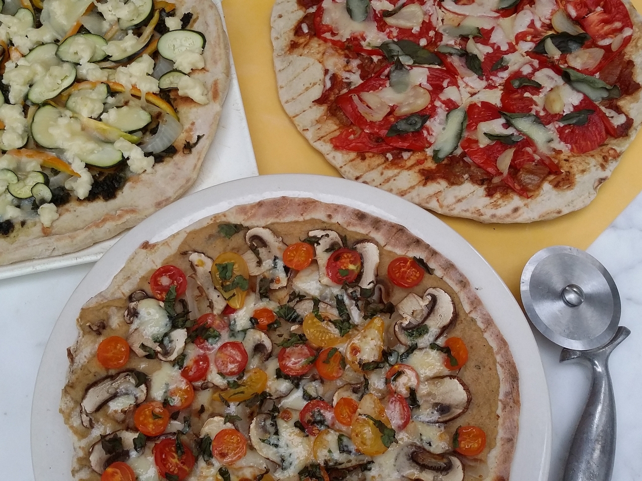 Grilled Sourdough Pizzas. Learn more at TwiceasTasty.com.