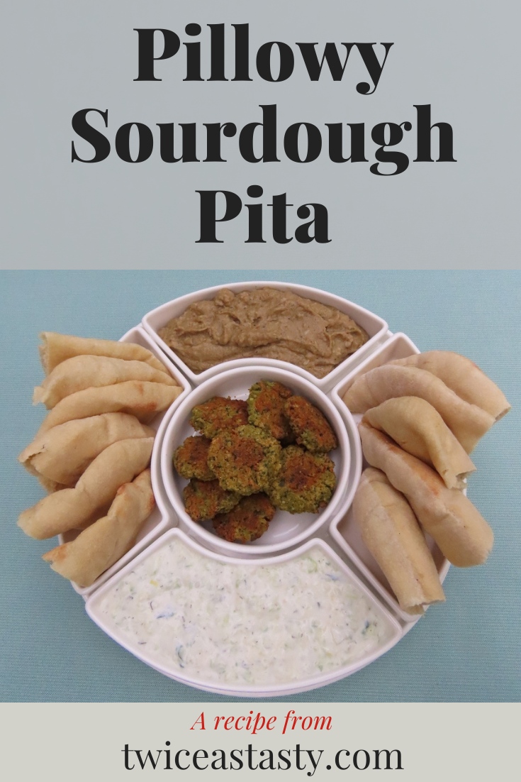 As they bake, sourdough pitas puff into floury pillows before collapsing into flatbread. Get sourdough recipes at TwiceasTasty.com.