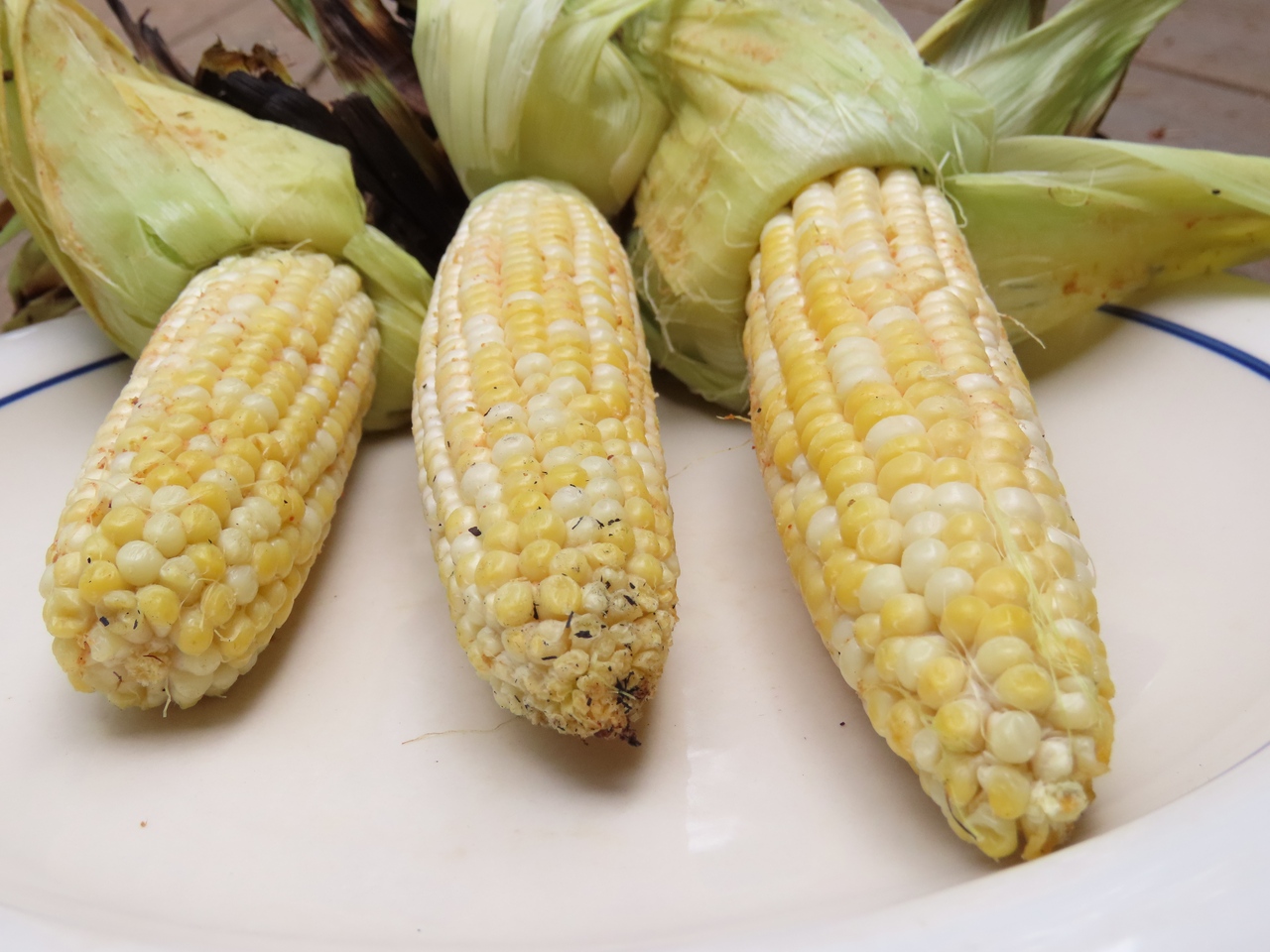  Husk-Grilled Corn with Smoky Lime Butter.Get the recipe at TwiceasTasty.com.
