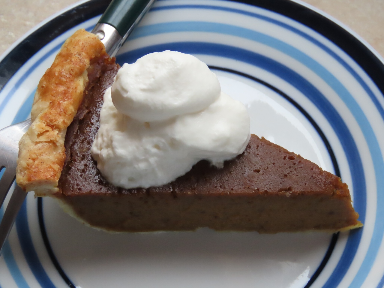 Creamy Roasted Pumpkin Pie. Get the recipe at TwiceasTasty.com.