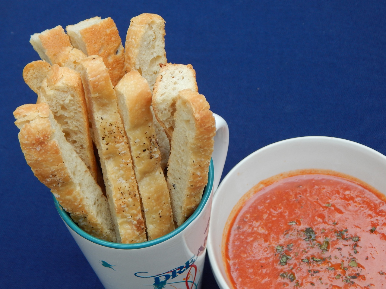 A desire for hot-from-the-oven bread tops my reasons for making sourdough focaccia. Learn more at TwiceasTasty.com.