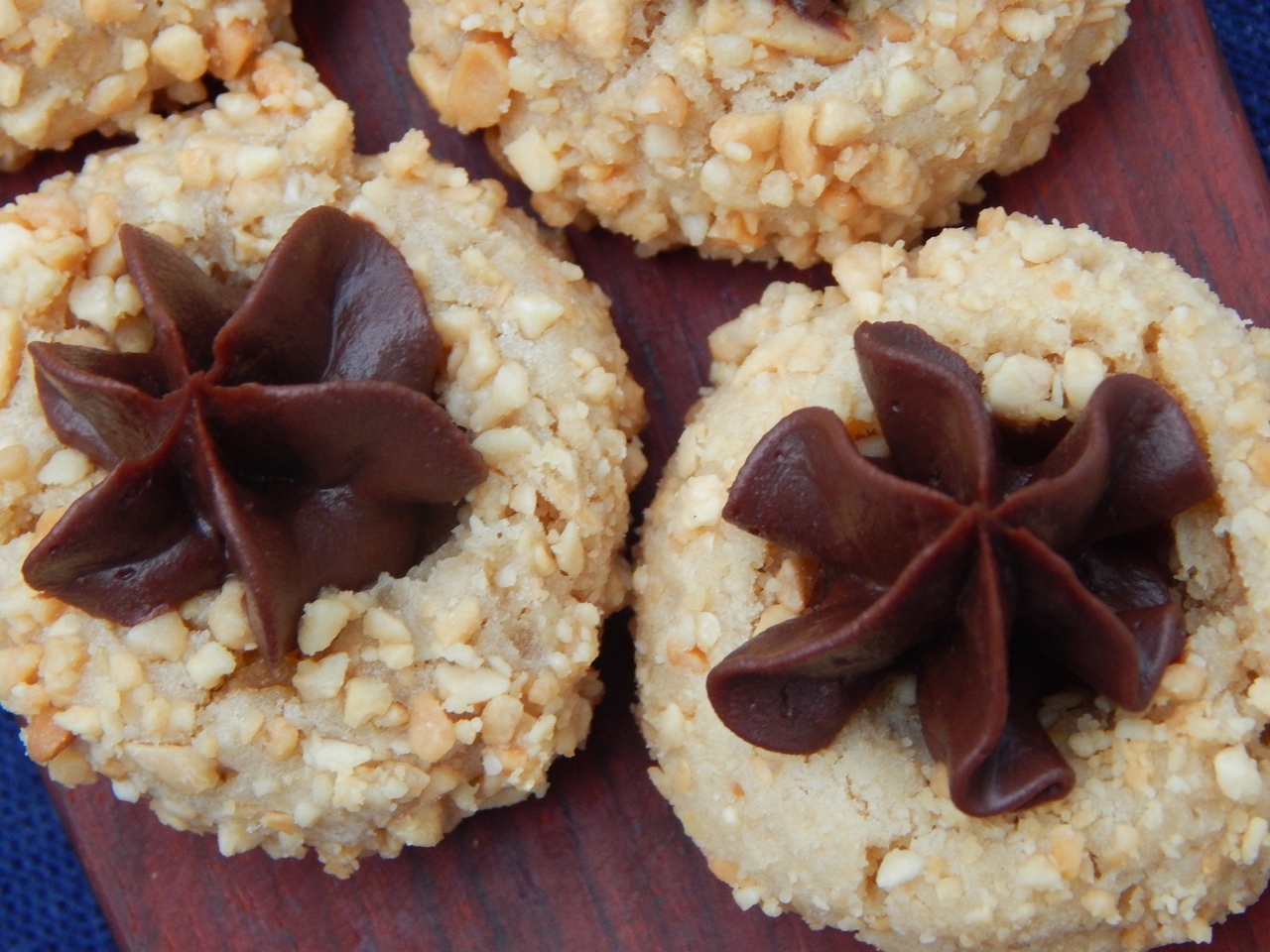 Peanut Butter Thumbprint Cookies with Ganache. Get the recipe at TwiceasTasty.com.