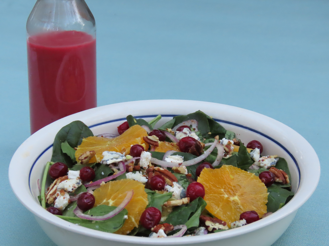 Spinach Salad with Cranberry Sauce Dressing. Get the recipe at TwiceasTasty.com.