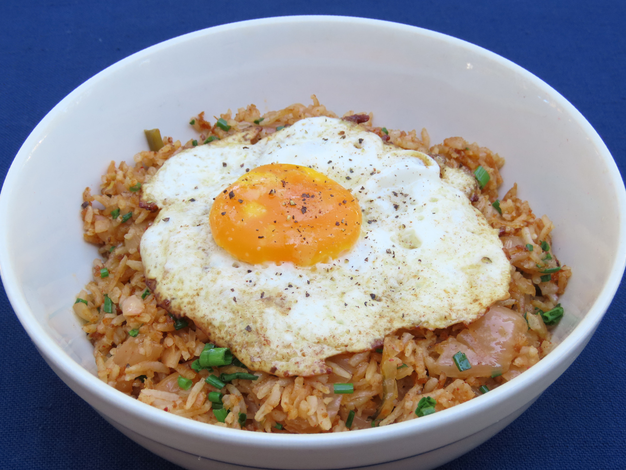 Kimchi Fried Rice. Get the recipe at TwiceasTasty.com.
